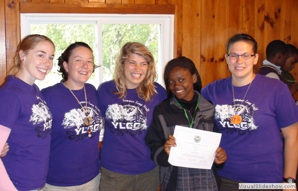A Summer Camp Participant receiving a Certificate Participation